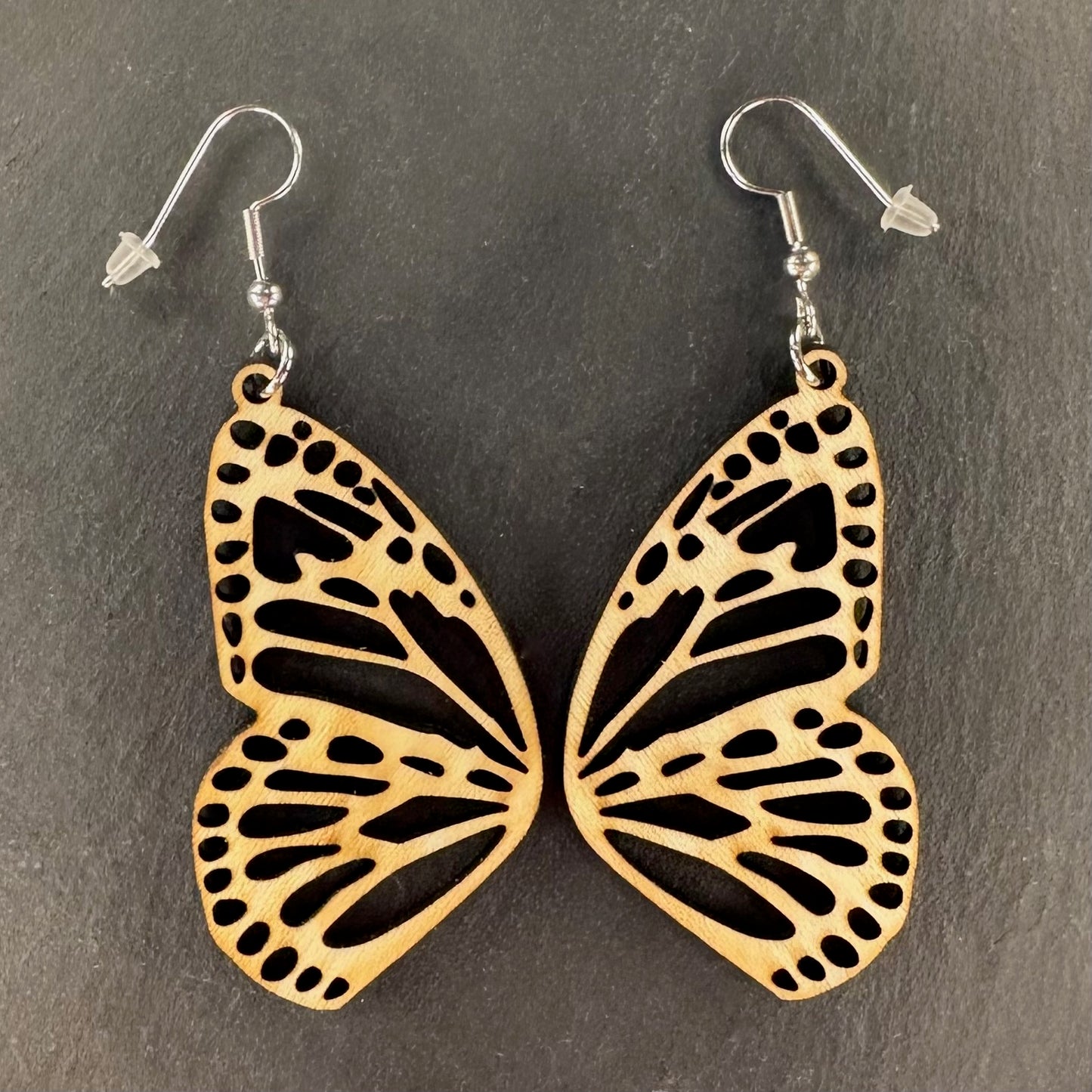 Made in Brisbane, Australia. 50mm long. Monarch butterfly, Danaus plexippus, wooden earrings on stainless steel hooks.