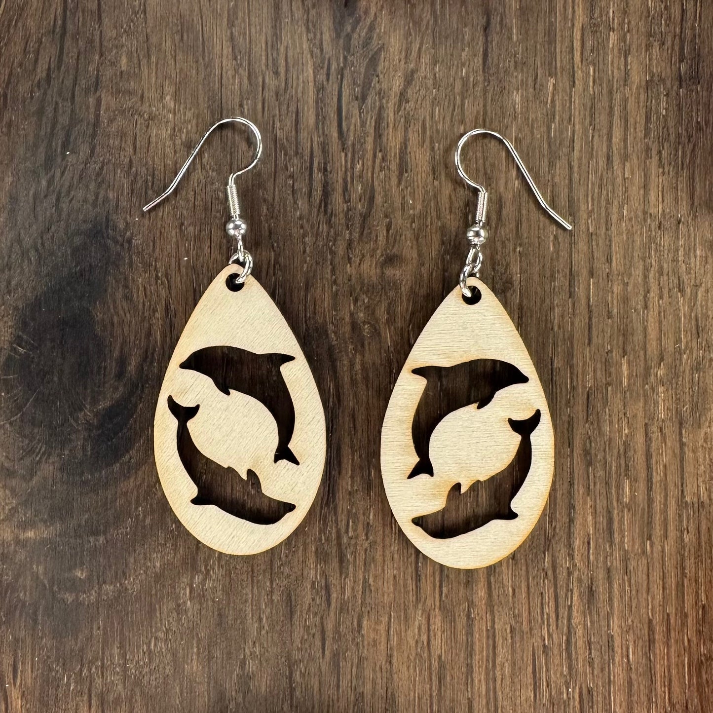 Made in Brisbane, Australia. 40mm long. Dolphin teardrop, wooden earrings on stainless steel hooks.