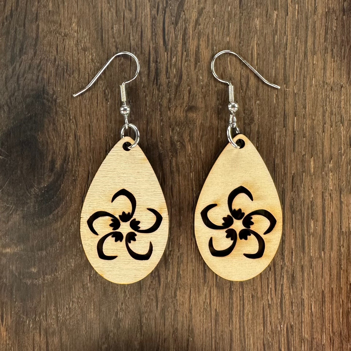 Made in Brisbane, Australia. 40mm long. Frangipani teardrop, wooden earrings on stainless steel hooks.