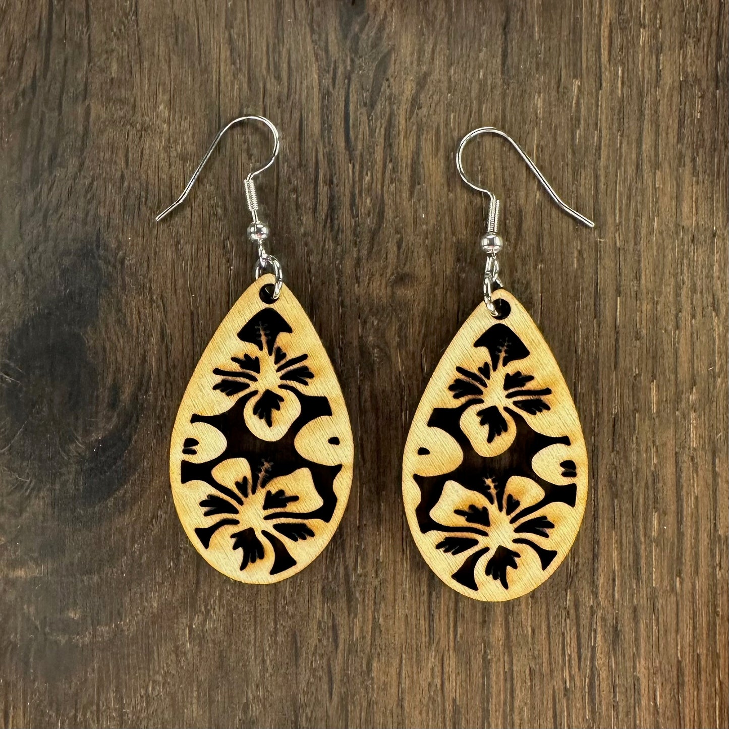 Made in Brisbane, Australia. 40mm long. Hibiscus teardrop wooden earrings on stainless steel hooks.