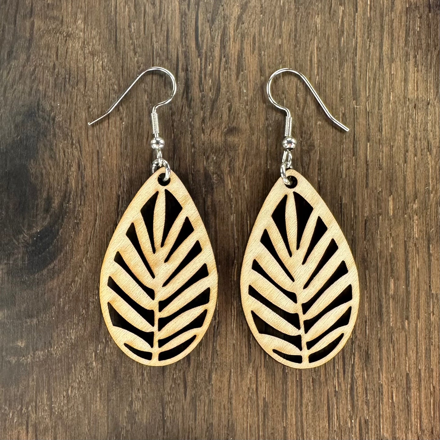 Made in Brisbane, Australia. 40mm long. Palm Leaf teardrop wooden earrings on stainless steel hooks.