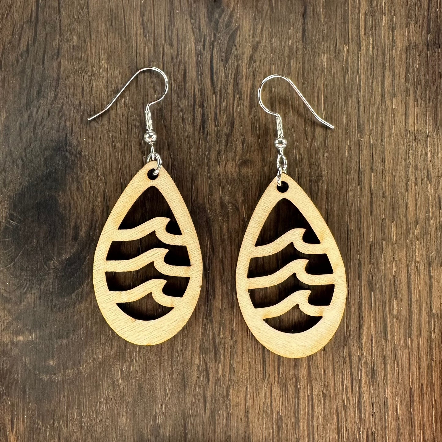 Made in Brisbane, Australia. 40mm long. Waves teardrop wooden earrings on stainless steel hooks.