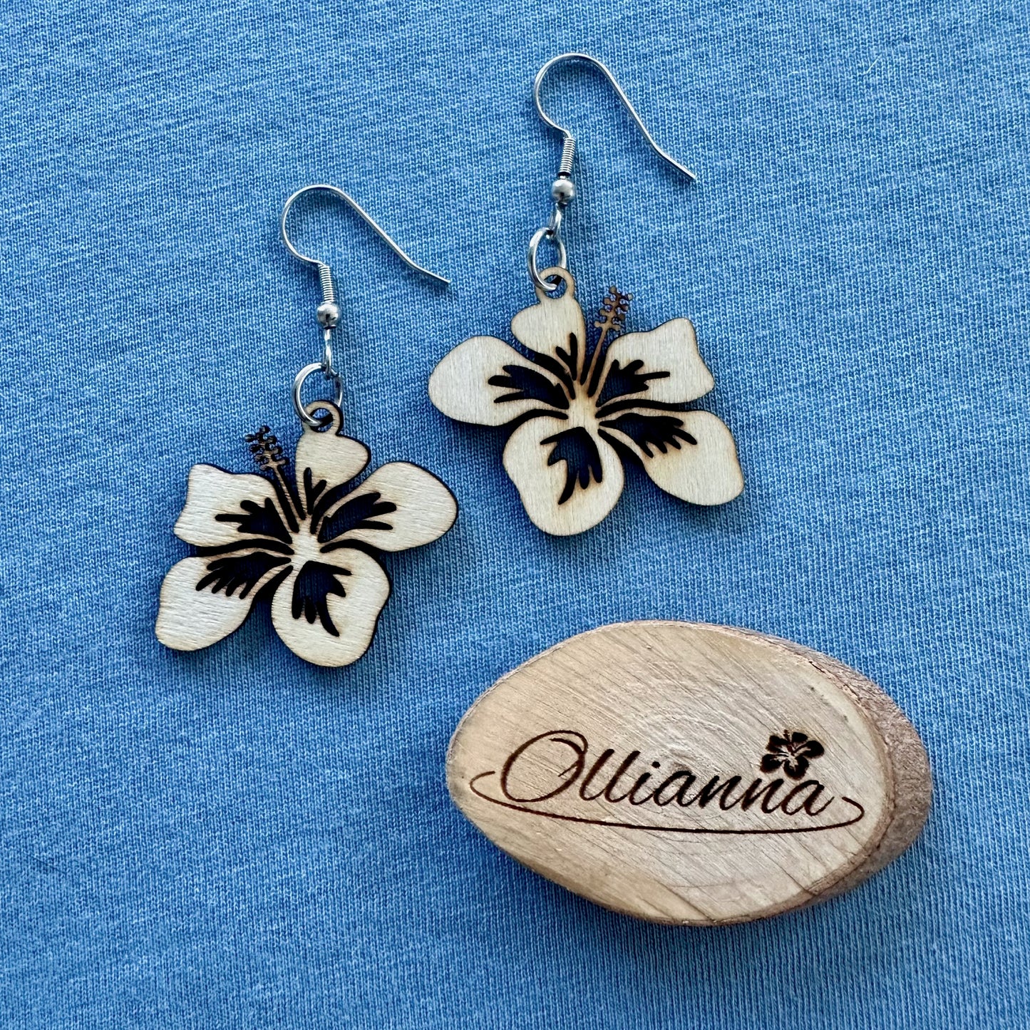 Made in Brisbane, Australia. 35mm wide Hibiscus design wooden earrings on stainless steel hooks.