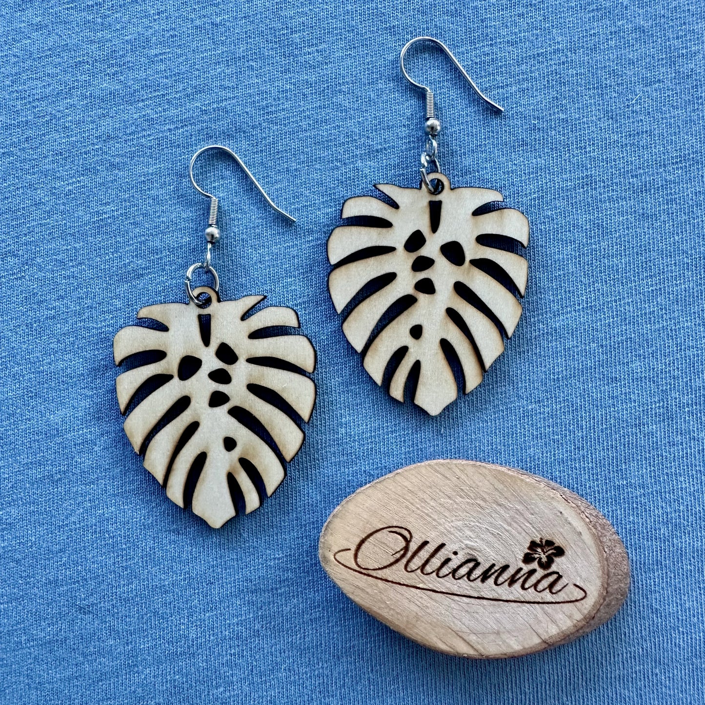 Made in Brisbane, Australia. 40mm long monstera leaf design wooden earrings on stainless steel hooks