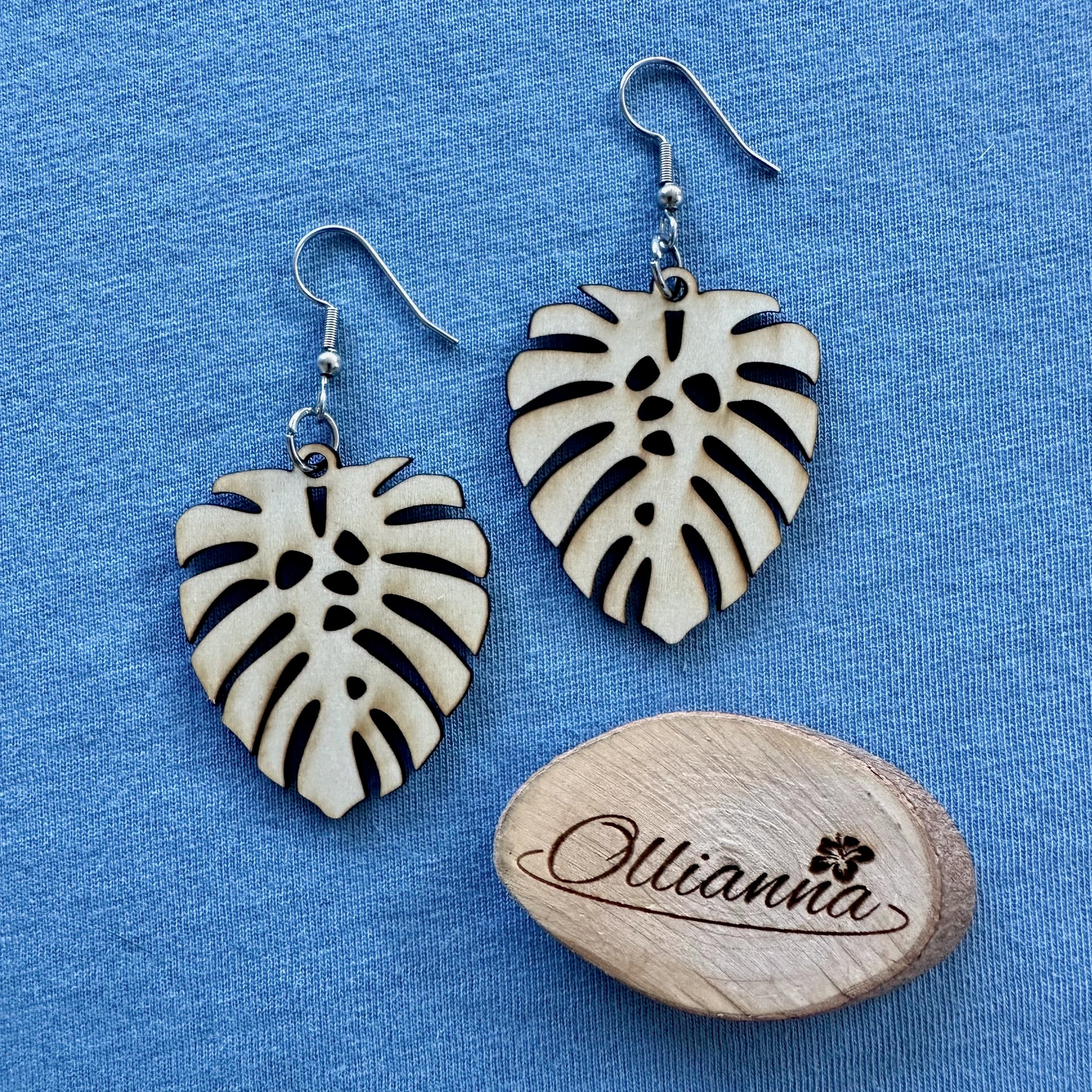 Made in Brisbane, Australia. 40mm long monstera leaf design wooden earrings on stainless steel hooks